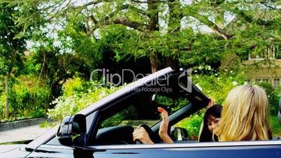 Caucasian Girls in Luxury Cabriolet