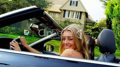 Caucasian Girls Driving Luxury Car