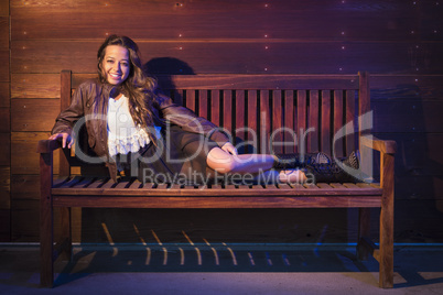 Mixed Race Young Adult Woman Portrait Sitting on Wood Bench