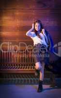 Mixed Race Young Adult Woman Portrait Against Wooden Wall