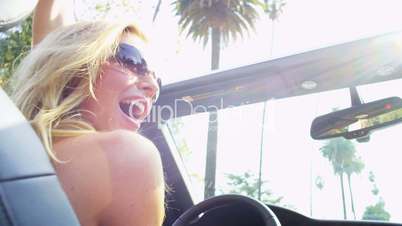 Blonde Girl Excited Driving Cabriolet