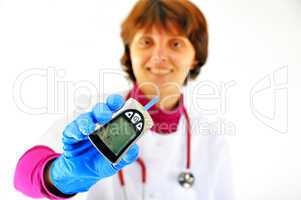 doctor checking diabetic's blood sugar