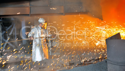 mill worker with hot steel