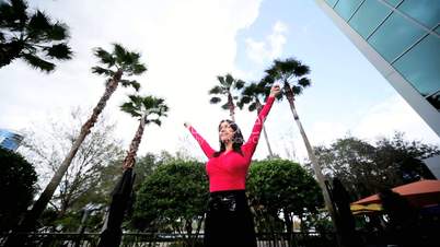 Successful Businesswoman Outside Downtown Skyscrapers