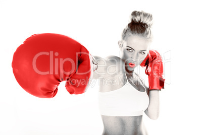 sexy woman delivering a punch