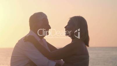 Active retired people, romantic elderly couple in love, kissing