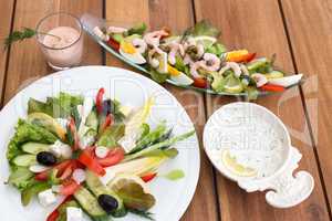 Greek salad and shrimp cocktail
