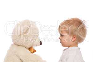 Cute child and teddy bear