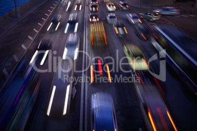 Car traffic at night. Motion blurred background.