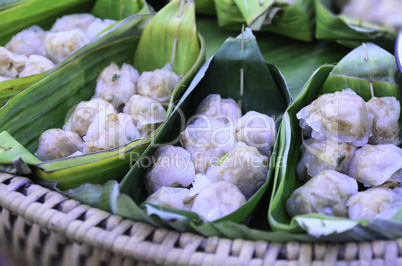 Malcolm dumplings steamed in banana leaves