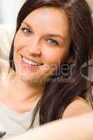 Portrait of beautiful young smiling woman