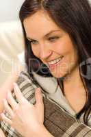 Friendly portrait of happy brunette woman