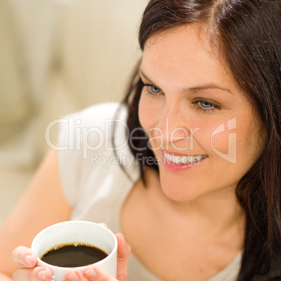 Close up woman holding cup of coffee