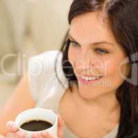 Close up woman holding cup of coffee