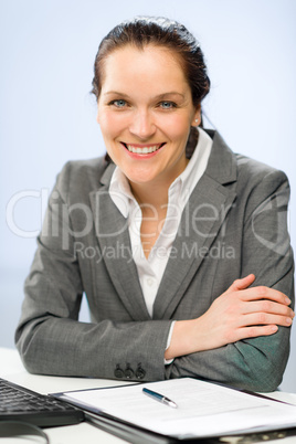 Confident smiling businesswoman looking at camera
