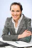 Confident smiling businesswoman looking at camera