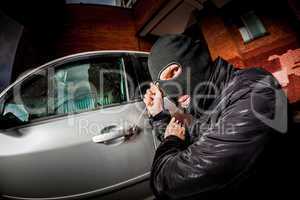 Car thief in a mask.