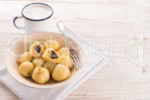 potato dumplings with plums full