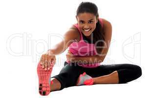 Fitness girl doing stretching exercise