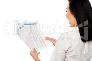 Cheerful female manager holding business reports