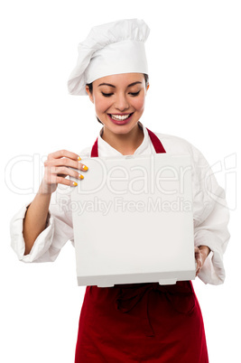 Confident female chef portrait