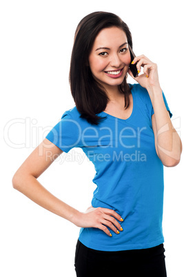 Young girl speaking over cellphone