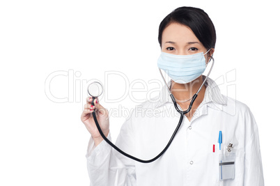 Female physician posing with stethoscope