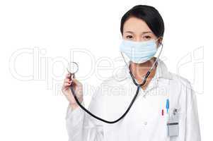 Female physician posing with stethoscope