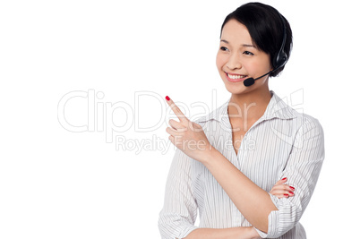 Customer support staff pointing away