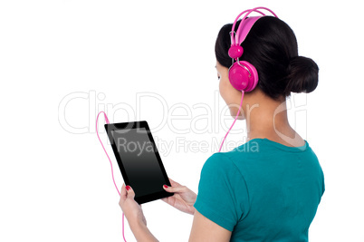 Young girl enjoying music