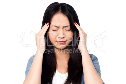 Young girl having headache