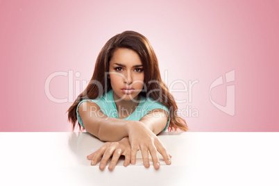 brunette sitting on the table