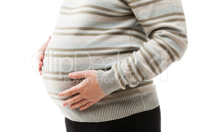 pregnant woman touching or bonding her abdomen