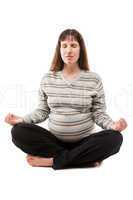 Beauty pregnant woman meditating in yoga exercise