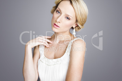 attractive blond woman looking softly to the camera