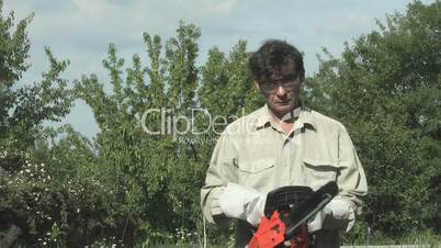 Master demonstrates chainsaw
