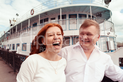 Playful couple enjoying outdoors Playful couple enjoying outdoors