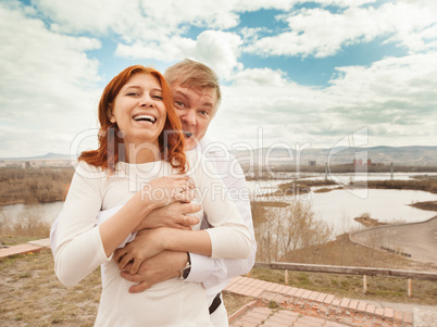 Playful couple enjoying outdoors