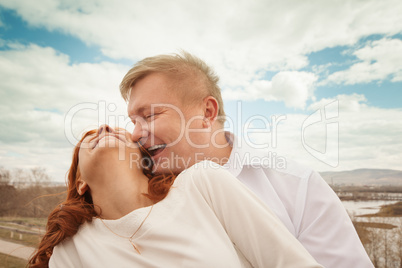 Playful couple enjoying outdoors