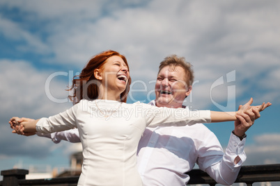 Playful couple enjoying outdoors