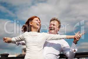 Playful couple enjoying outdoors