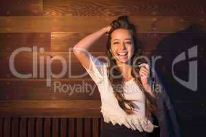 Mixed Race Young Adult Woman Portrait Against Wooden Wall