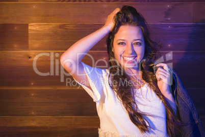 Mixed Race Young Adult Woman Portrait Against Wooden Wall