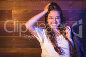 Mixed Race Young Adult Woman Portrait Against Wooden Wall