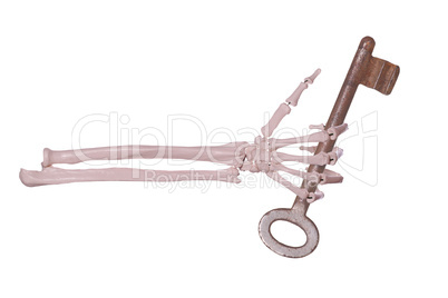 skeleton hand with rusty key