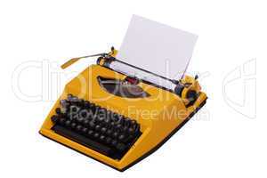 yellow typewriter with paper