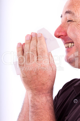 Man with a paper handkerchief