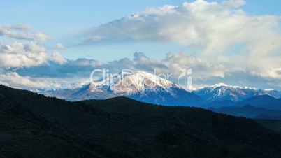 Ice capped mountain peaks panorama landscape