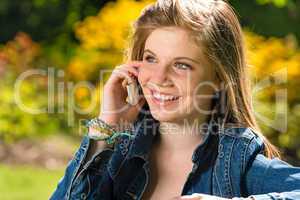 Pretty young girl talking on the phone
