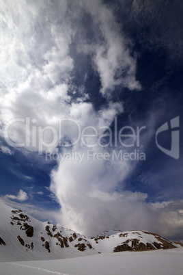 snow mountains and sky with clouds